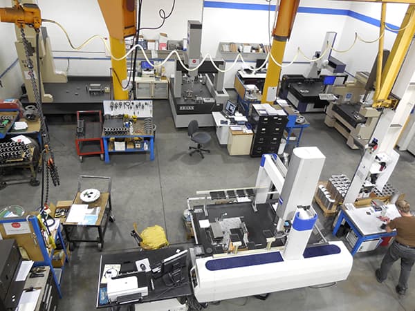Overhead view of the inspection lab with CMMs