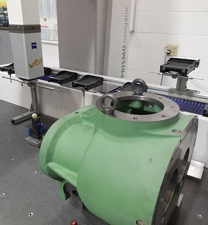 Green cast housing on a Zeiss CMM in the inspection lab